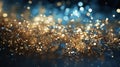 Abstract background featuring sparkling golden glitter over a dark blue bokeh effect, evoking a magical night sky. Royalty Free Stock Photo