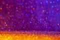 Abstract background filled with shiny gold and purple glitter Royalty Free Stock Photo