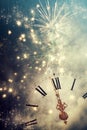 Abstract background with fireworks and clock close to midnight Royalty Free Stock Photo