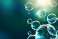 Abstract background of floating soap bubbles with a gradient blue-green Royalty Free Stock Photo