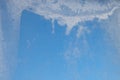 Abstract background of frosty water on cold window glass. Frosty original pattern on winter window glass, natural texture Royalty Free Stock Photo