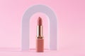 Abstract background with geometric forms for product presentation lipstick, lipgloss on pink background. arch to show