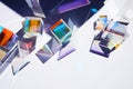 Abstract background with glass geometric figures prisms with light diffraction of spectrum colors and complex reflection