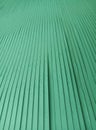 Abstract background of green cardboard sheets arranged sequentially and lined up to form perspective lines Royalty Free Stock Photo