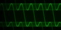 Abstract background - green signal oscilloscope on black background Royalty Free Stock Photo