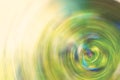 Abstract Background of green tone spin circle radial motion blur