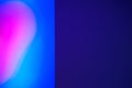 Abstract background with half pink heart shape on blue color and violet empty side. Blurred backdrop, copy space