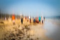 Abstract background image of people walking on the beach in the style of the Impressionists. Royalty Free Stock Photo