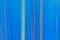 Abstract motion blur background in cold blue with vertical and diagonal lines