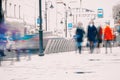 Abstract background. Intentional motion blur. City in the early spring. Street, girl walking on the sidewalk, concept of