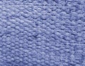 This is an abstract background of intertwined periwinkle-colored threads. The texture of the weave. A place to copy. Very Peri