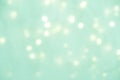 Abstract background. light celadon green blurry lights. bokeh. texture. concept for christmas, new year, holiday Royalty Free Stock Photo