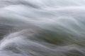 abstract background from long exposure of water stream in a mountain river Royalty Free Stock Photo