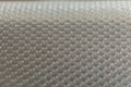 Abstract background of lots of grey pimples dots. Plastic surface with pimples