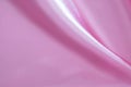 Abstract background of luxury pink wrinkled silk cloth, liquid waves, wavy folds for background texture Royalty Free Stock Photo