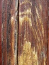 Abstract background. macro texture. fragment . contemporary art. an old wooden board covered with brown red stain and paint, with