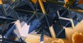 Triangles and metallic pyramids making patterns. Royalty Free Stock Photo