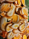 Abstract background of mandarin peel pieces