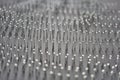 Abstract background of many iron pins. Selective focus.