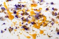 Abstract background with many petal of Limonium flower and spilled honey