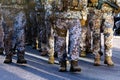 Abstract background on military theme. Soldier rank, legs, close-up. Front view. - image