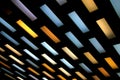 Abstract background, multi colored rectangles on black background. Ceiling hanging yellow, blue, lilac, white lamps on black Royalty Free Stock Photo