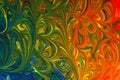 Abstract background of multicolored liquid paint swirls Royalty Free Stock Photo