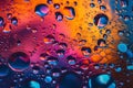 Abstract background of multiple bubbles of oil in liquid over multicolored background
