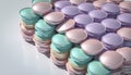 Pastel Colored Mint Candy Discs Stacked on White Surface Royalty Free Stock Photo