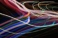 Abstract background of night light on street. Multicolored striped lines in motion made from lighting effect ,Light trails over