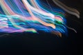 Abstract background of night light on street. Multicolored striped lines in motion made from lighting effect ,Light trails over