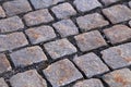Abstract background of old cobblestone pavement close-up Royalty Free Stock Photo