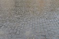 Abstract background. Old cobblestone pavement close up Royalty Free Stock Photo