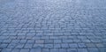 Abstract background. Old cobblestone pavement close up Royalty Free Stock Photo