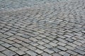 Abstract background of old grey cobblestone pavement road in old european city Royalty Free Stock Photo