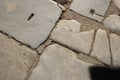 Abstract background of old marble cobblestone pavement.