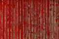 Abstract Background of old painted wood. Wooden fence with traces of old cracked faded paint on the wood surface Royalty Free Stock Photo