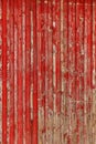 Abstract Background of old painted wood. Wooden fence with traces of old cracked faded paint on the wood surface Royalty Free Stock Photo