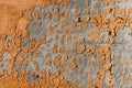 Abstract Background with Orange Paint Scrapings on a Wall