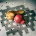 Abstract background with a pair of pears on a table with openwork shadow
