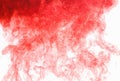 Abstract background. Red ink in water, in motion. Color drop swirling. Colorful cloud of paint on white. Royalty Free Stock Photo