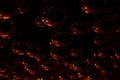 Abstract background of red orange glass bubbles or balls spheres over black. Royalty Free Stock Photo