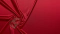 Abstract background from red silk satin and heart. Fabric texture with draped. Copy space. Element design. Valentine`s day Royalty Free Stock Photo