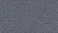 Abstract background with a repeating pattern of small, uneven, gray squares. Royalty Free Stock Photo