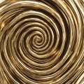 A gold metal spiral background with a shiny and luxurious surface. The metal has a smooth and polish Royalty Free Stock Photo