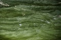 Abstract background of river water flow under the influence of light. Daylight Royalty Free Stock Photo