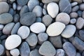 Abstract background with round pebble stones. Stones beach smooth. Top view. Summer day Royalty Free Stock Photo