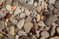 Abstract background with round peeble stones close up. Royalty Free Stock Photo