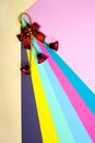 Abstract background of sheets of colored paper with a Christmas toy Royalty Free Stock Photo