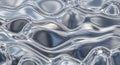 Abstract background of shiny metallic liquid surface with smooth undulating waves and reflective silver texture Royalty Free Stock Photo